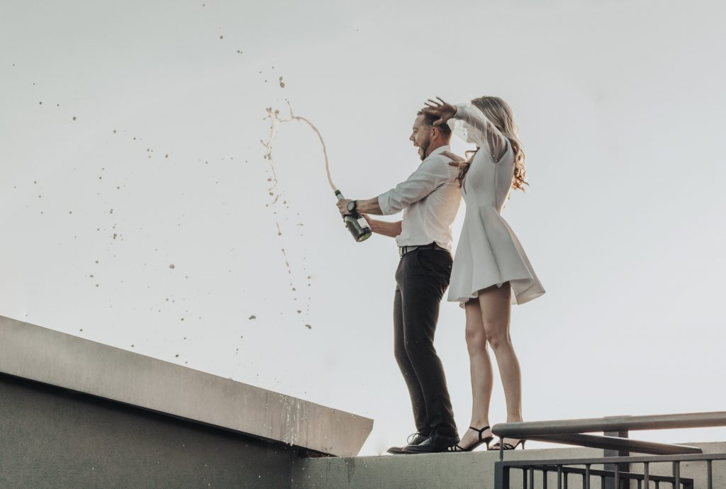 Couple on rooftop at sunset - 2